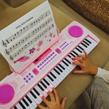 Imagem de Teclado Musical Infantil Rosa Com Microfone suporte Partitura luminoso Recarregavel