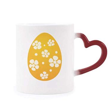 Imagem de Caneca de grés com design de ovo amarelo para festivais de religião da Páscoa sensível ao calor com mudança de cor vermelha