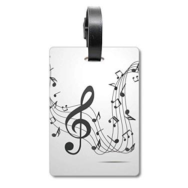 Imagem de Flappg — Bolsa preta com notas musicais e etiqueta para bagagem