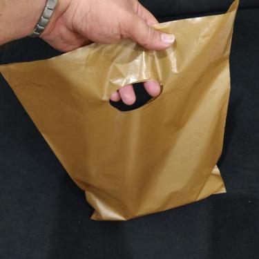 Imagem de 1 Quilo de sacolas plásticas boca triste/vazada , TEMOS AS MEDIDAS 20X