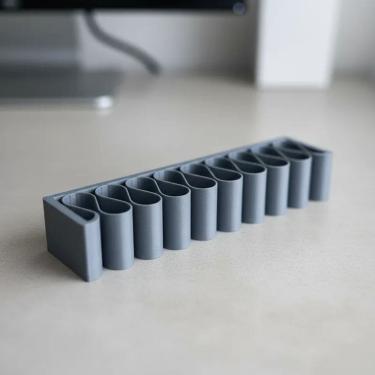 Imagem de suporte organizador universal  para cabos de carregamento usb