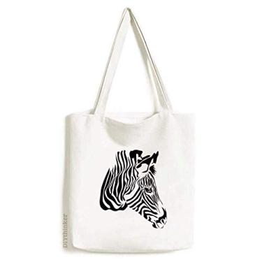 Imagem de Bolsa tiracolo de lona marrom com cabeça de pinto