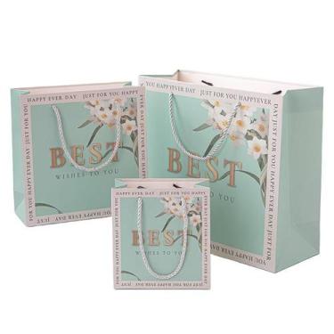 Imagem de Conjunto de sacolas de presente com design floral azul em três tamanho