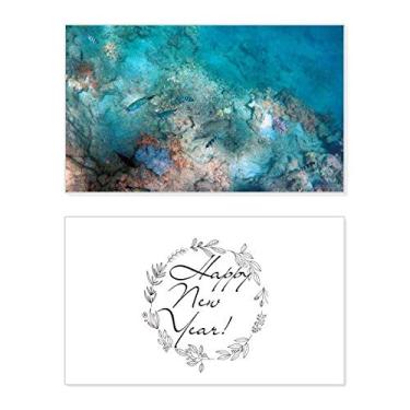 Imagem de Cartão de felicitações com mensagem de abençoe presente de ciência de peixe colorido oceano