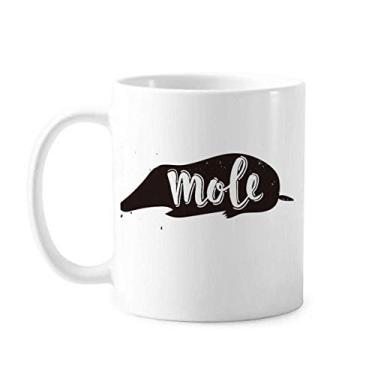 Imagem de Caneca de cerâmica para café em porcelana preta e branca com estampa de animal