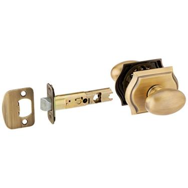 Imagem de Baldwin PSELLTAR049 Elipse de passagem de reserva com arco tradicional rosa em latão fosco e acabamento preto, Maçaneta