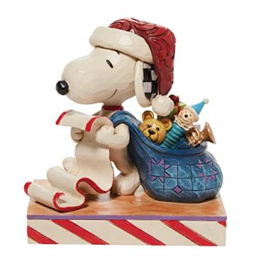 Imagem de Enesco Jim Shore Peanuts Papai Noel Snoopy com lista de Natal e estatueta de saco de brinquedo, 9,7 polegadas, multicolorido