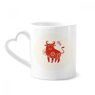 Imagem de Ano de boi animal China zodíaco caneca vermelha café cerâmica copo de coração