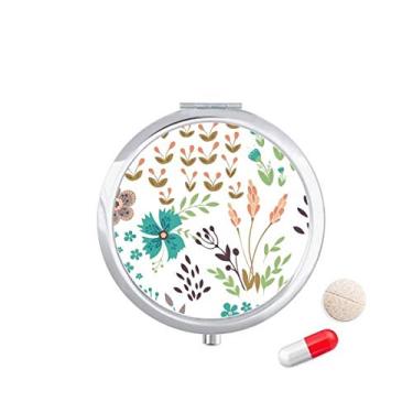 Imagem de Caixa de comprimidos de tinta vegetal colorida com flores para guardar remédios