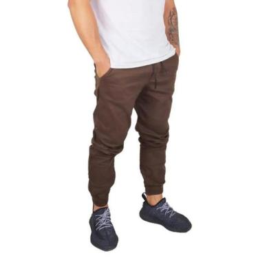 Imagem de calça jeans jogger masculina jeans rasgado, sarja com elastico e bolso