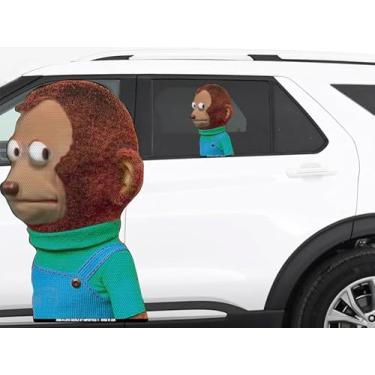 Imagem de O decalque de janela transparente perfurado de 30,5 cm se fixa à janela traseira do carro. Feito nos EUA. (macaco olho lateral)