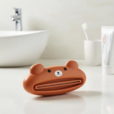 Imagem de Dispensador de pasta de dente com desenho animado, rolo espremedor de pasta de dentes para cremes/limpador facial/cuidados com a pele, 9 x 4 cm (urso marrom)