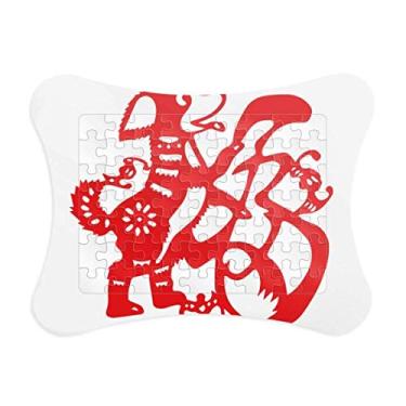 Imagem de Enfeite de quebra-cabeça de ano novo chinês com corte de papel para cachorro