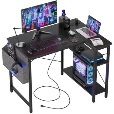 Imagem de TIQLAB Mesa de canto pequena em forma de L para jogos de computador com tomadas, prateleiras reversíveis para estudo, mesa de escrita para casa, escritório, quarto, sala de estar, 101,6 cm, preta