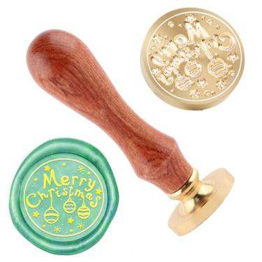 Imagem de Carimbo de lacre de cera de Natal e uma cabeça de carimbos de cabo de madeira para decoração de presente cartões de natal envelopes de ano novo lacre de cera