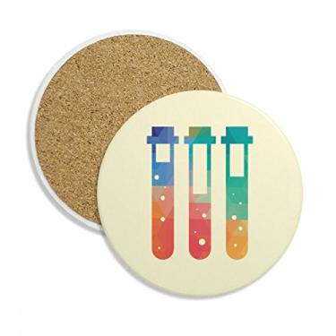 Imagem de Diferentes tubos de teste de líquidos, caneca porta-copos de química, pedra absorvente de proteção de mesa