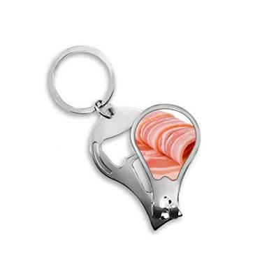 Imagem de Rolo de cordeiro carne crua textura de alimentos cortador de unhas abridor de chave tesoura