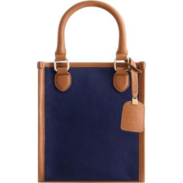 Imagem de Concept One Bolsa feminina Tommy Bahama, bolsa de viagem de lona norte-sul com alça de ombro ajustável e acabamento em couro, azul marinho/marrom, Azul-marinho/bronze, Bolsa feminina Tommy Bahama,