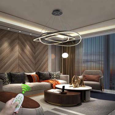 Imagem de Luminária pendente moderna de LED para restaurante, com intensidade regulável, em metal, com controle remoto, na cor preta. Possui luzes circulares irregulares e é ideal para sala de estar,