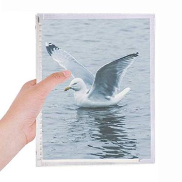 Imagem de Caderno com imagem natureza de pássaro do mar, água, oceano, folha solta, diário recarregável, papelaria