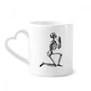 Imagem de Caneca de desenho de esqueleto humano rezando caneca de café cerâmica copo de coração de vidro