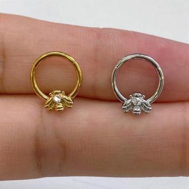 Imagem de Argola aço abelhinha zircônia clicker dourada 1,2mm - no-brand