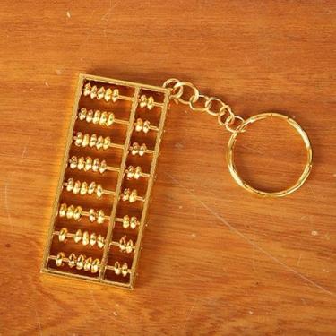 Imagem de 6 cm com chaveiro, liga de zinco, banhado a ouro, pingente diário, abaco, chaveiro