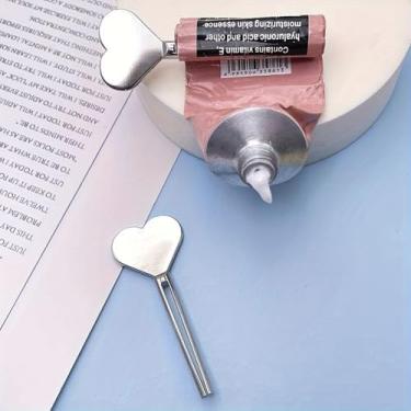 Imagem de Espremedor de tubo em forma de coração de metal dourado - dispensador de pasta de dente/rolo cosmético, auxílio de espremer para vida diária (prateado)