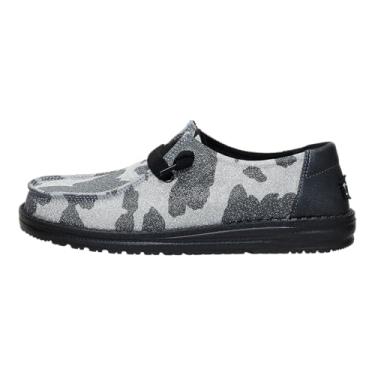 Imagem de HEYDUDE Mocassins femininos Wendy Sparkle com estampa animal | Tênis de caminhada leve e confortável para mulheres, Vaca, 41