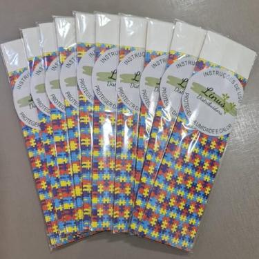 Imagem de Pulseira de Identificação TEA Autismo em Tyvek – Símbolo do Autismo, À Prova d’Água, Ajustável e Segura – Para Crianças, Jovens e Adultos – Conscientização e Proteção Diária – Kit com 50 unidades.