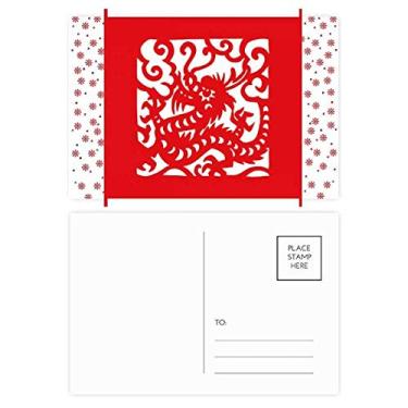 Imagem de Cartão-postal de celebração com flor de Natal do zodíaco da China com corte de papel dragão
