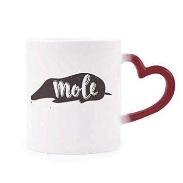 Imagem de Caneca de grés preta e branca com estampa de animal sensível ao calor vermelha que muda de cor